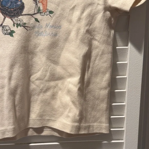 Brandy Melville Cream Tee with Blue and Orange Design - Picture 4 of 4